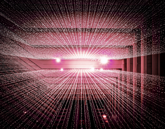 A technology array is presented with lines of bright lights coming from the middle of the image.