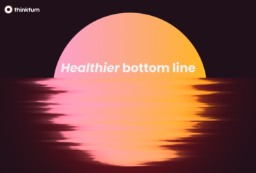 A black background boasts an image of what depicts a setting sun in water with ripples reflecting off the water. The words Healthier bottom line are shown.